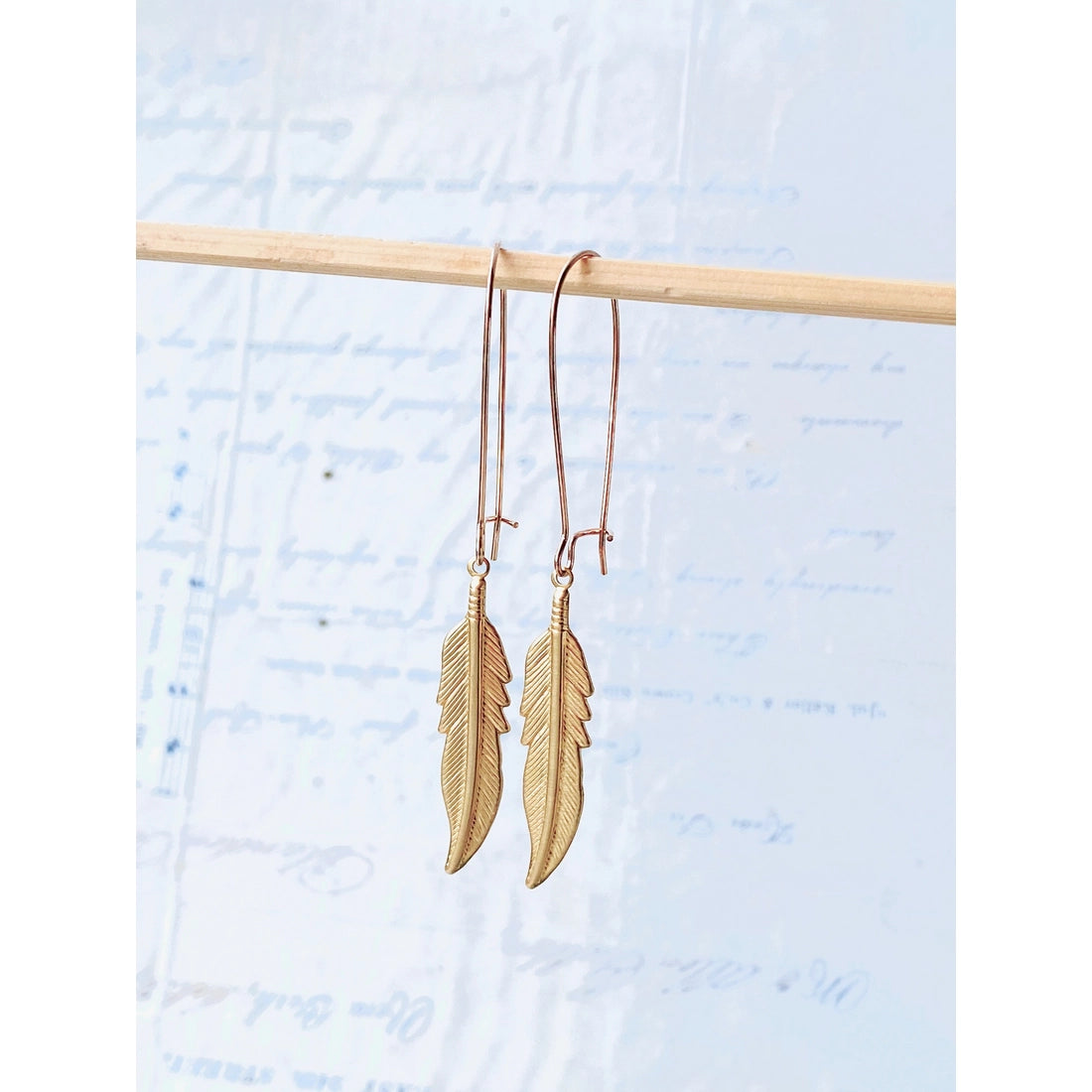 Long Gold Feather Earrings