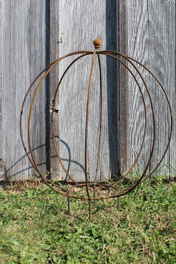 Round topiary with small ball final and rust finish